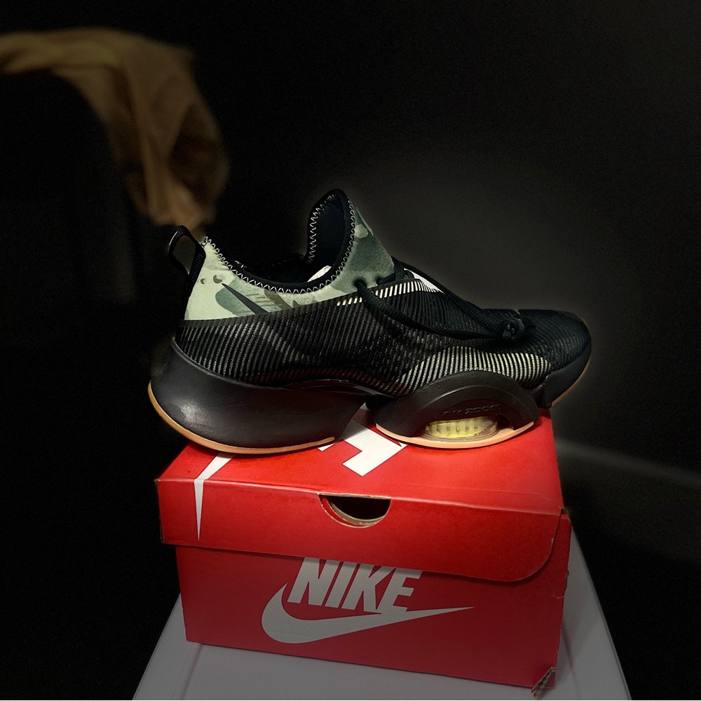 Nike Black and Green Sneakers with Classic Design